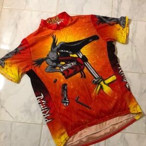 Primal wear biking shirt. Zip front. Back pockets.